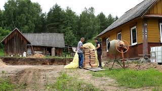 Renovation of an old house Preparing a loadbearing wall for the terrace Laying a sewer system [upl. by Roht]