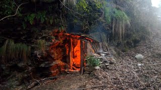 Build a Secret bushcraft shelter with fireplace inside  Winter camping in extreme cold weather [upl. by Arinay877]