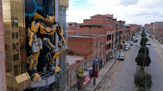 Colorful buildings featuring superheros a booming trend in Bolivian city [upl. by Tremml]