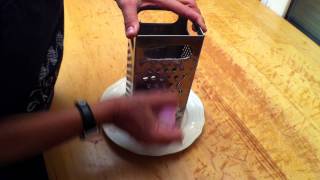 GreekFoodTv☼Grating an Onion the Greek Way with Diane Kochilas [upl. by Acnaiv142]