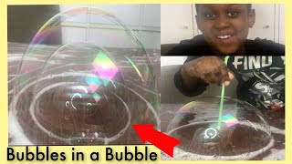 Blowing Bubbles inside a Bubble  Fun Easy Science [upl. by Letsou]