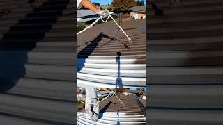 Airless Spray Painting a Metal Roof3 roofpainting roofspraying [upl. by Hermann545]