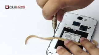 Phone Doctors Tech Tips  How to remove a stripped screw with a rubber band [upl. by Noivaz]