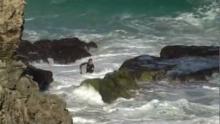 Surfer getting smashed on rocks [upl. by Nael]