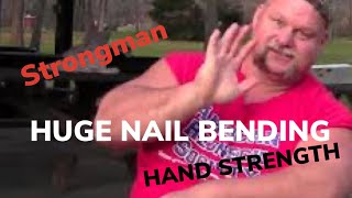 Strongman Steve McGranahan bending 60D nails [upl. by Llekcir]