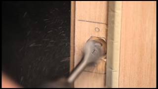 Installing a latch bolt strike plate nonmortise door  Video 6 [upl. by Finella]