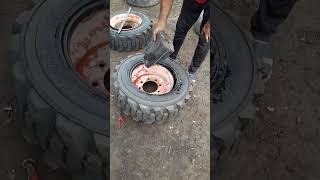 ٹائر تبدیل کرنے کا طریقہhow to change tyre Bobcat S130 S150 S450 S753 S630 S220 subscribe bobcat [upl. by Blumenthal]