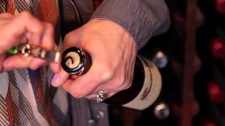 Opening wine with a double lever corkscrew [upl. by Yhtuv]