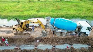 Excavator and cement dump truck Workingbuild a fence of 1000 meters [upl. by Sudbury]