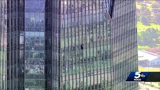 Antiabortion rights activist scales tallest tower in Oklahoma City [upl. by Aelegna]