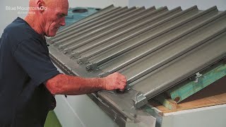 How to Install Steel Gutter Mesh on a KlipLok® roof  Roof Edge with Saddles [upl. by Hughie]