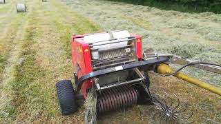 Kubota compact tractor and mini round baler [upl. by Lebisor]