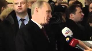 Vladimir Putin and his wife Lyudmila vote at in the Russian presidential elections [upl. by Capwell]