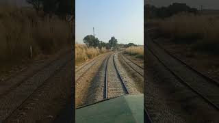 Beautiful live view of train in curve crossing Kaluwal railway station in mountains Pakistan shorts [upl. by Nuriel]