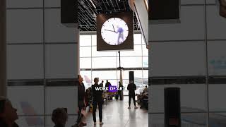 Man in the clock  Amsterdam Airport Schiphol [upl. by Lanrev]