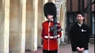 The moment a Queens Guard soldier lost it and drew his gun at annoying tourist [upl. by Guimar]