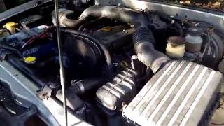 1999 Opel Frontera Sport 22i faulty serpentine belt tensioner noise [upl. by Azalea689]