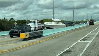 LARGE Center Console BOAT falls off trailer [upl. by Nnaycnan122]