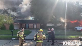 Raw video Firefighters work to put out house fire in La Porte Texas [upl. by Dlopoel]