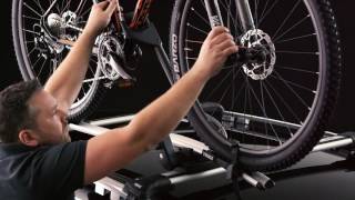 Thule 598 Roof Top Bike Carrier Instructional Video [upl. by Yzmar]