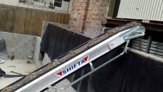 How to Back fill a retaining wall with a portable conveyor from City Hire Brisbane [upl. by Aelaza]