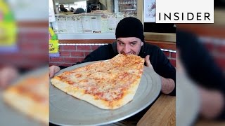 You can buy a 2footlong pizza slice in NYC [upl. by Naerad]