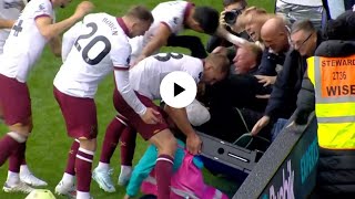 West Ham stars rescue ball boy after celebrating fans fall through advertising boards  Fall Moment [upl. by Dinse]