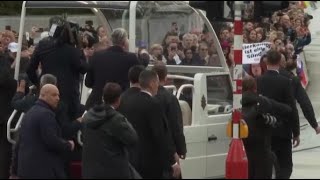 Watch the moment protester runs out in front of popemobile during Francis Luxembourg visit [upl. by Aihppa]