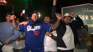 Fans outside Dodger Stadium ecstatic after seeing Dodgers win pennant [upl. by Dermot]