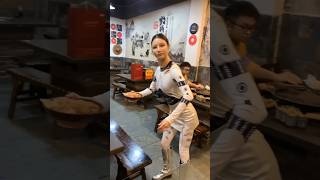 A Robotic Waiter Serves Food at a Chongqing Hotpot Restaurant in China robotserver [upl. by Orravan486]