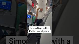 Rabbi Nosson Neuberger entertaining a delayed plane with a game of Simon Says [upl. by Kylen]