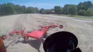 Raking hay for dad with the 4610 an kuhn [upl. by Dee Dee]