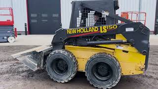 2002 New Holland LS150 Skid Loader [upl. by Enelrihs438]