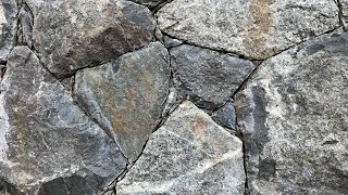 Secrets to creating a beautiful NATURAL STONE WALL Insights from a real stonemason [upl. by Haliak]