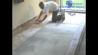 Installing Solid Oak Floor onto concrete with Rewmar MS Polymer Flexible Adhesive [upl. by Anikahs156]