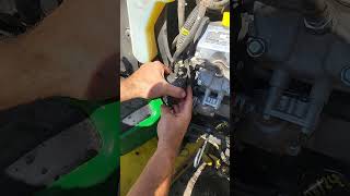 How to change the fuel filter on your John Deere X738 mowerrepair smallenginerepair [upl. by Nylessej]