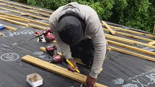 Battening the roof in preparation for the Velux and tiles [upl. by Fillender]