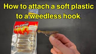 How to attach a soft plastic to a weedless hook [upl. by Hardie89]