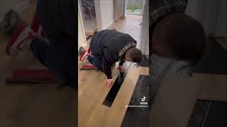 Fitting laminate flooring in a hallway laminateflooring viral homedecor [upl. by Timotheus]