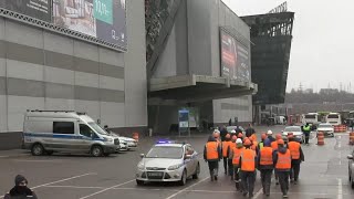 Emergency workers arrive at destroyed Moscow concert hall [upl. by Olvan773]