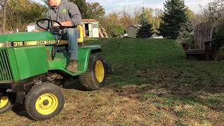 John Deere 318 Dethatching And Aerating The Yard [upl. by Reppiks105]