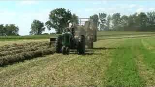 Baling hay with a John Deere 630 tractor and 336 baler [upl. by Booker]