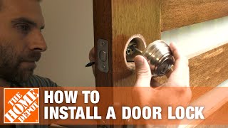 How to Install a Door Lock  The Home Depot [upl. by Atterbury]