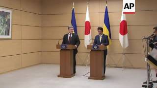 Poroshenko meets Abe in Tokyo [upl. by Andras654]