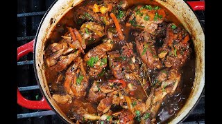 The Ultimate Jamaican Brown Stew Chicken  CaribbeanPotcom [upl. by Nerrak]