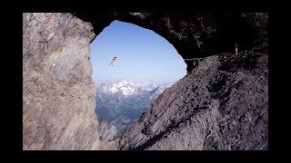 Professional Highliners set up a 25m long Highline through a famous hole in the Swiss Alps [upl. by Kerat740]