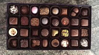 Opening and Unboxing a box of Purdys Chocolates [upl. by Ecirtel]