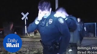 Cop breaks down in tears after shooting armed robbery suspect  Daily Mail [upl. by Gariepy]