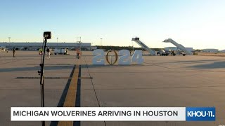 Michigan Wolverines arriving in Houston for the college football championship [upl. by Ayadahs27]