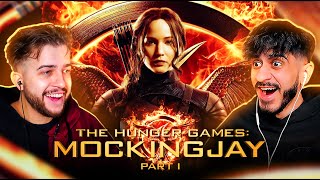 Watching THE HUNGER GAMES MOCKINGJAY PART 1 for the FIRST TIME and its INSANE Movie Reaction [upl. by Atsyrk]